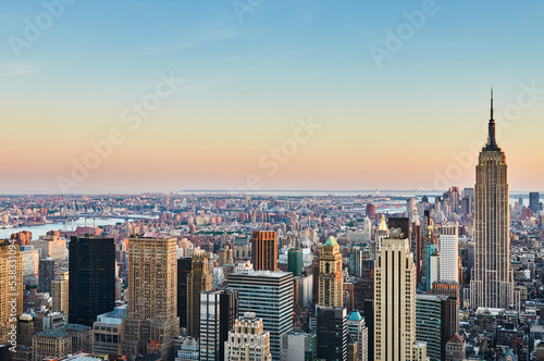 View of a cityscape at dusk from above in color © Sergio