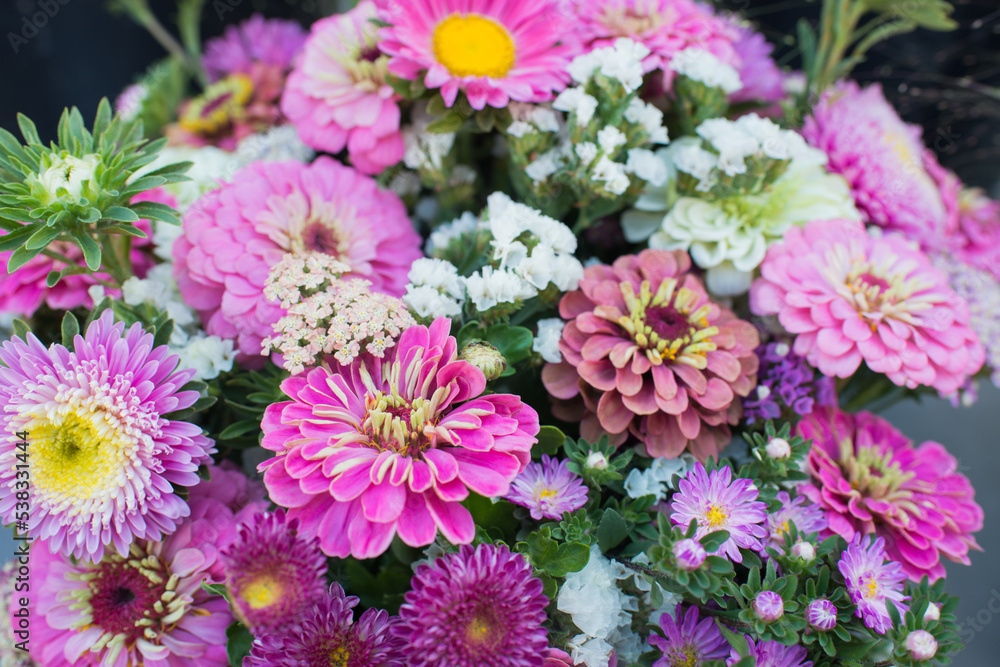 Assorted bouquet of flowers in pink and white