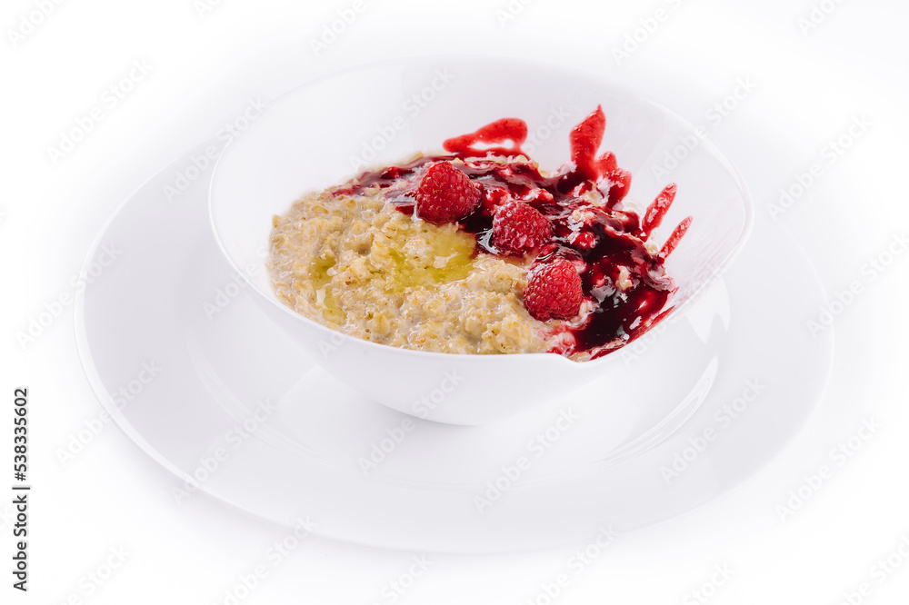 Oatmeal rustic porridge with raspberries jam Oatmeal rustic porridge with raspberries jam