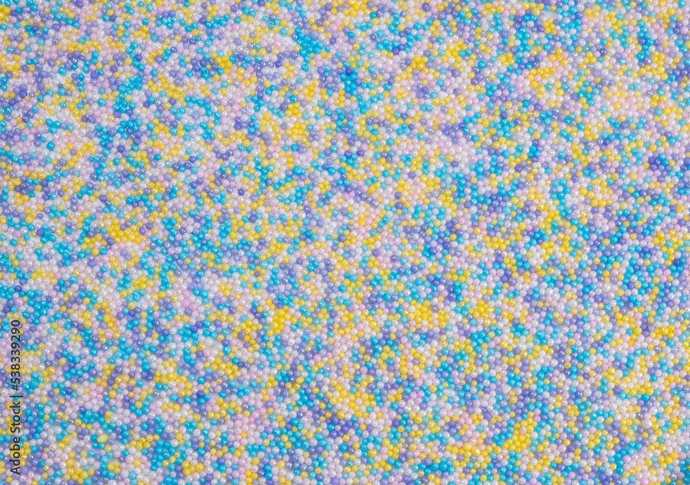  background of colorful sprinkles for sweets or beads or small balls. The concept of celebrating a birthday, party or other holidays. trendy, cute background