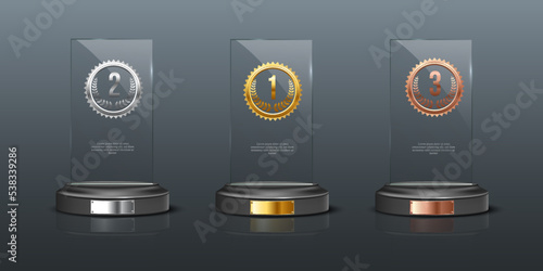 Glass awards realistic vector illustration. Crystal prizes with golden, silver and bronze medals 3D isolated clipart set on gray background. Competition winner rewards. Trophy design elements