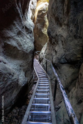 stairs leading down through rocks