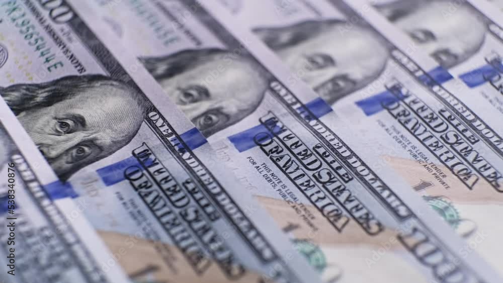 Rich business economy of usa. Finance and richness concept. Cash money banknotes. 100 american dollar bills. Calculation of 100 american bill banknotes. Close-up in 4K, UHD Rich business economy of usa. Finance and richness concept. Cash money banknotes. 100 american dollar bills. Calculation of 100 american bill banknotes. Close-up in 4K, UHD
