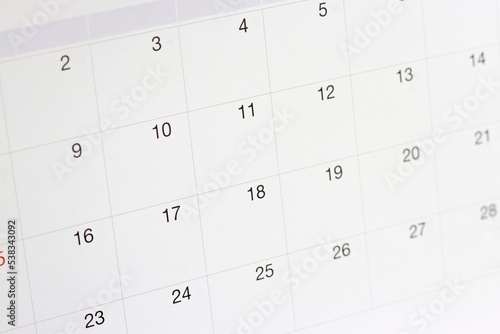 Dates on calendar page background,Closeup of numbers on calendar page 