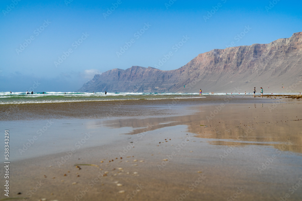 Famara Beach (Playa de Famara), popular surfing beach in Lanzarote. Canary Islands. Spain.
