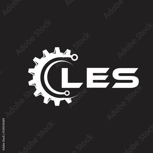 LES letter technology logo design on black background. LES creative initials letter IT logo concept. LES setting shape design.
