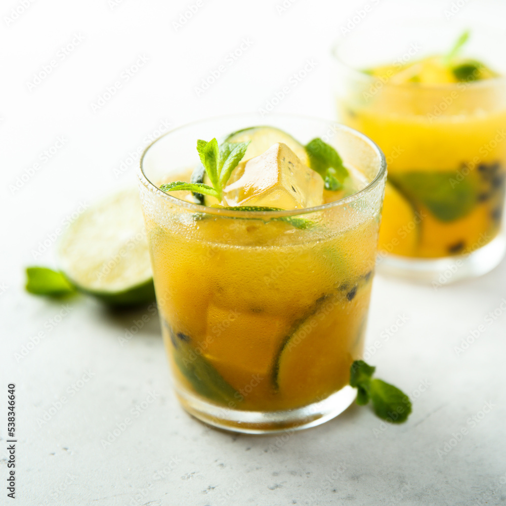 Refreshing passion fruit cocktail with lime