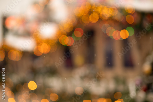 christmas blurred fair background with houses and lights