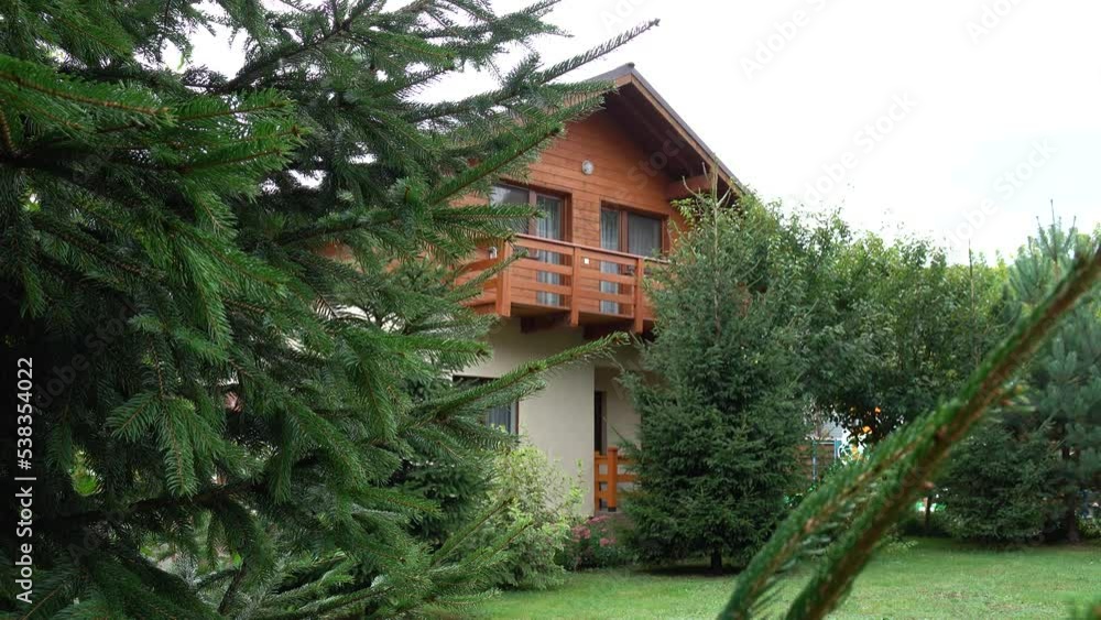 Country house with green back yard in sunny summer day Country house with green back yard in sunny summer day