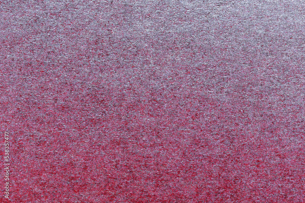 macro photography of red and silver spray paint on white paper macro photography of red and silver spray paint on white paper