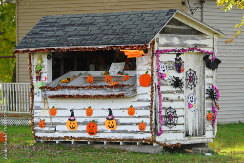 Shed on the countryside decorated with Halloween decorations for the holidays.