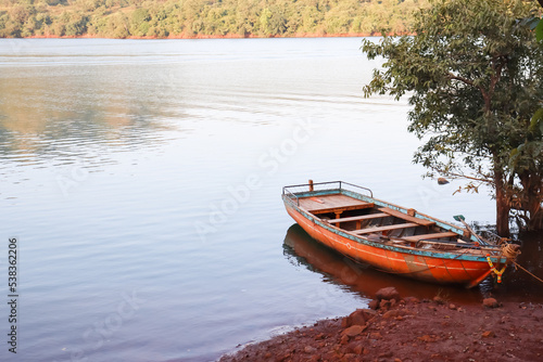 old wooden boat for tourist and transport at tapola backwater of koyna river