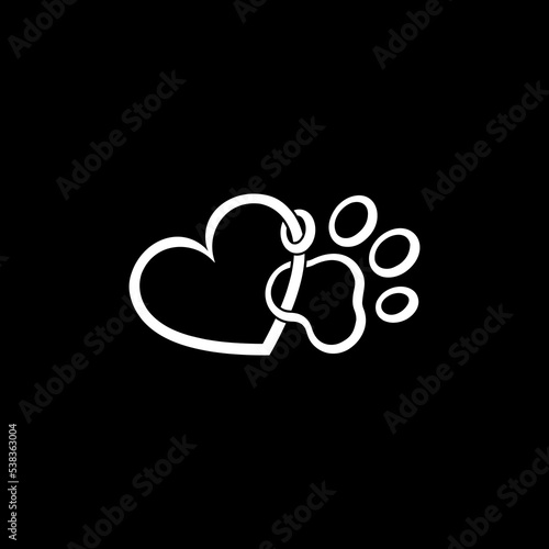 Paw and heart as a symbol icon isolated on dark background