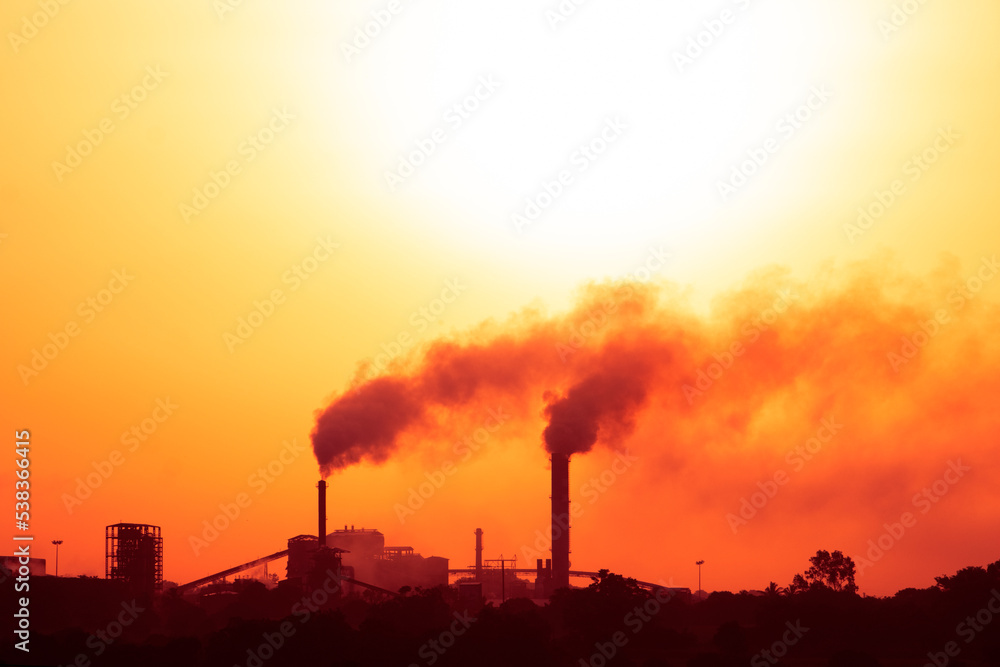 Silhouette industrial background, smoke stacks causing air pollution, industrial smoke emission. Silhouette industrial background, smoke stacks causing air pollution, industrial smoke emission.