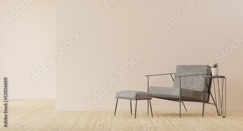 Grey chair in a room with wooden floor