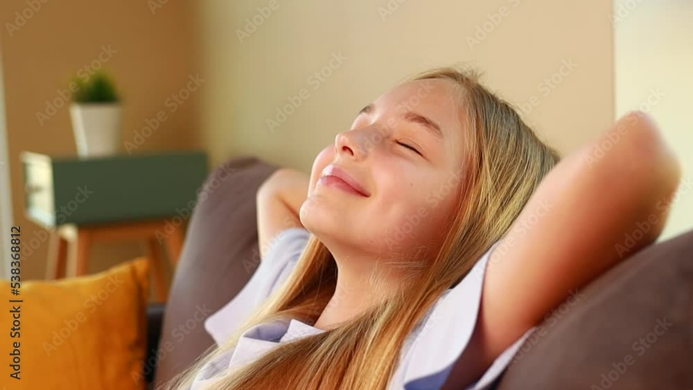 little cute girl sleeping on sofa after study in school daytime little cute girl sleeping on sofa after study in school daytime