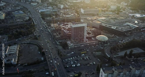 Aerial view of a large monopolis, the city of Kyiv at sunset, city roads photo