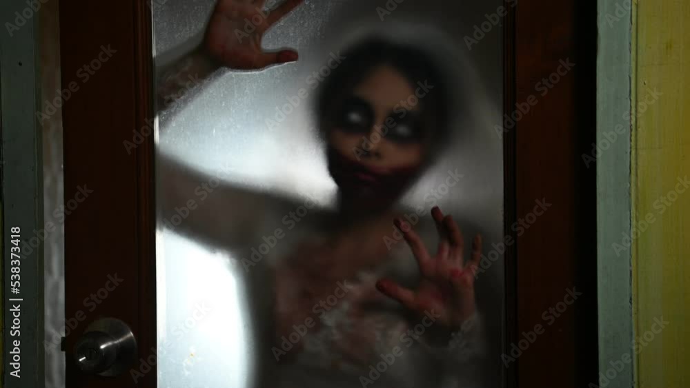 Portrait of asian woman make up ghost face with blood,Horror scene,Scary background,Halloween festival concept,Bride zombie 