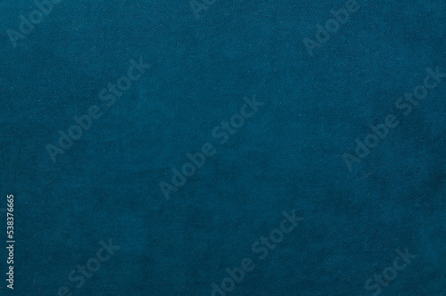 The texture of the fabric for furniture of a rich turquoise color. noisy structure