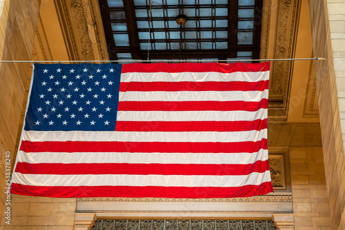 Close-up of the US national flag inside the Central Station building in New York