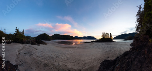 Sandy beach on Pacific Ocean Coast Panoramic View. Sunset Sky. San Josef Bay, Cape Scott Provincial Park, Northern Vancouver Island, BC, Canada. Canadian Nature Background Panorama