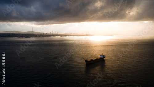 aerial view of cargo ship in sea of marmara in cloudy morning day
