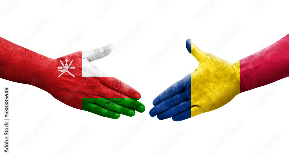 Handshake between Chad and Oman flags painted on hands, isolated transparent image.
