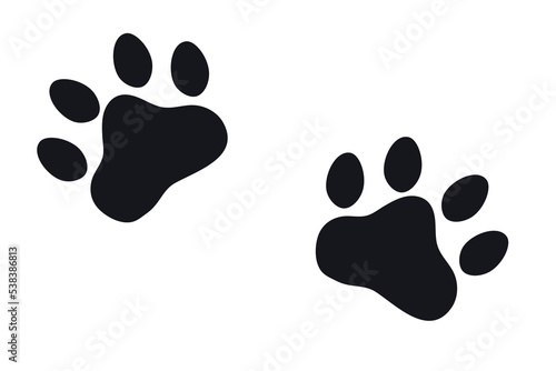 Silhouette of a cat's paw. Paw prints. The dog and cat puppy icon. A trace of a pet. The puppy's paws are highlighted on a white background. The paw of a black silhouette.
