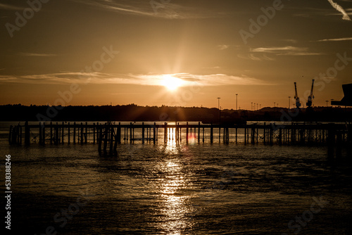 Landscape shots of a sunset over the docks in Southampton