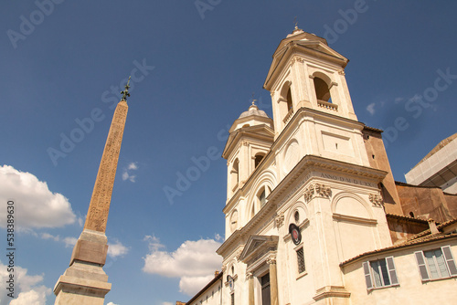 The Church of Trinita dei Monti at the top of the Spanish Steps with its obelisk in Rome, Italy
