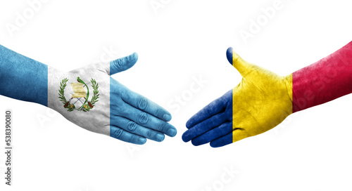 Handshake between Chad and Guatemala flags painted on hands, isolated transparent image.