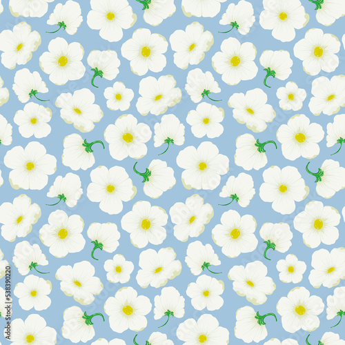 Nice white flowers. Strawberry flowers, strawberry flowers. Seamless floral pattern on a delicate blue background.