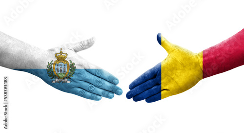 Handshake between Chad and San Marino flags painted on hands, isolated transparent image.