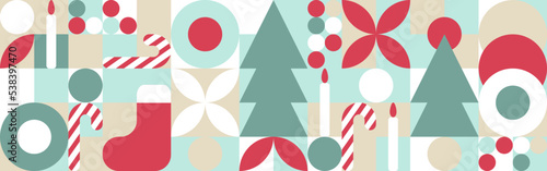 Geometric seamless pattern with winter patterns. New Year - trendy colored mosaic texture for textiles and wallpapers, Christmas symbols - Christmas tree, candles, stocking, candy cane, toys.