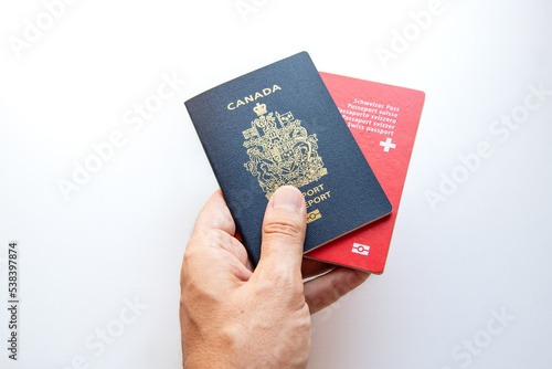 Passport and a vaccination card isolated on a white background photo