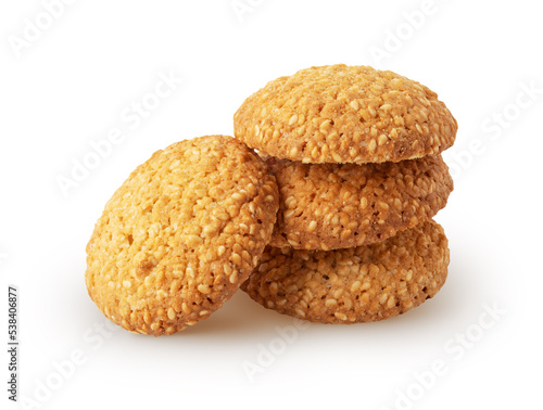 Stack of delicious oatmeal cookies with sesame seeds isolated on white backround with clipping path