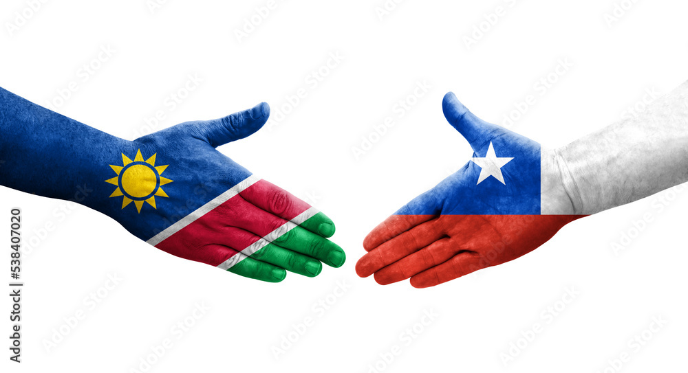 Handshake between Chile and Namibia flags painted on hands, isolated transparent image. Handshake between Chile and Namibia flags painted on hands, isolated transparent image.