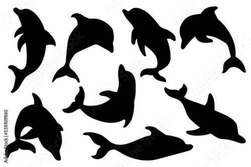 Set of silhouettes of aquatic mammals dolphins.Vector graphics.