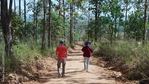 Wallpaper Mural Man and Woman Walking on Trail in Rainforest Torontodigital.ca