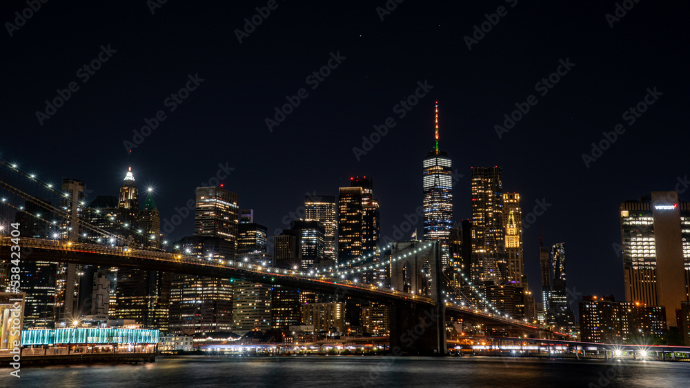 night time NYC Skyline + Bridge