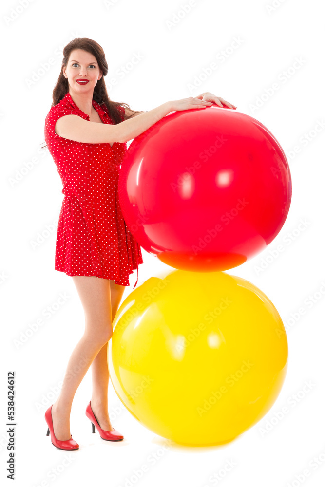 Beautiful woman in red dress with two big red and yellow balloons isolated on transparent background Beautiful woman in red dress with two big red and yellow balloons isolated on transparent background