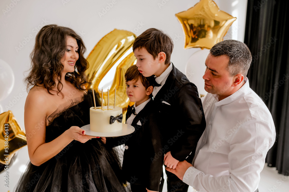 Birthday cake. boys blowing candle Birthday cake. boys blowing candle