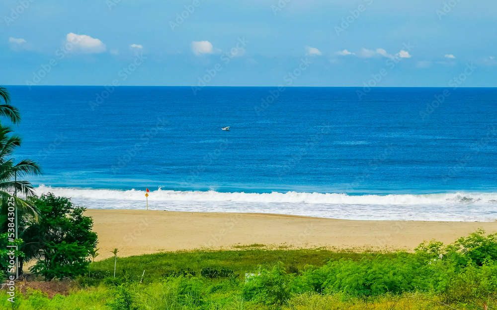 Extremely natural panorama surfer waves at beach Puerto Escondido Mexico.