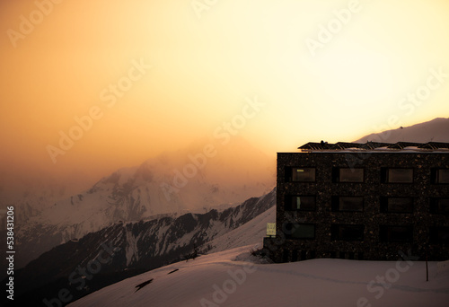 Hotel in the mountains during sunset   