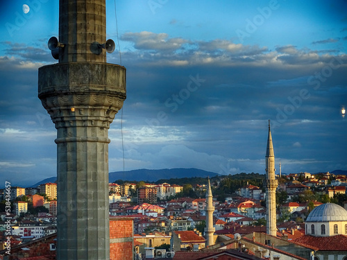 turkey, city of bartin minarets and sunset photo