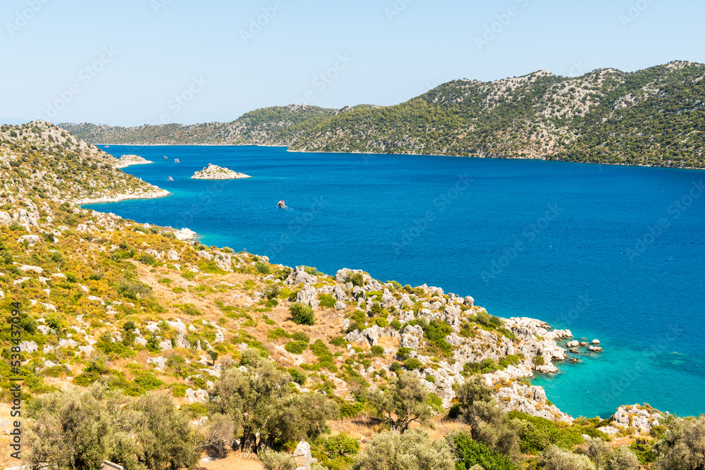 Aerial view over the the Mediterranean coastline east of Kalekoy village, with the Kekova island across the water, in Antalya province of Turkey.