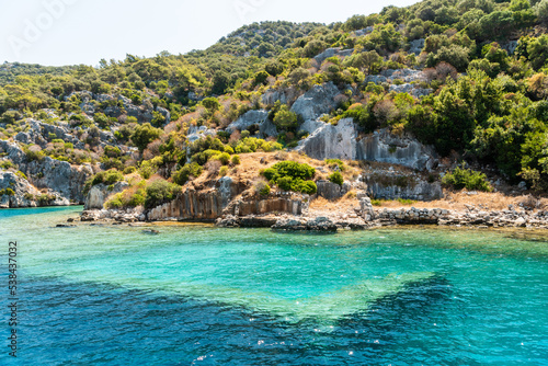 Coast of Kekova island with visible underwater structures of the Sunken City, in Antalya Province of Turkey © Alizada Studios