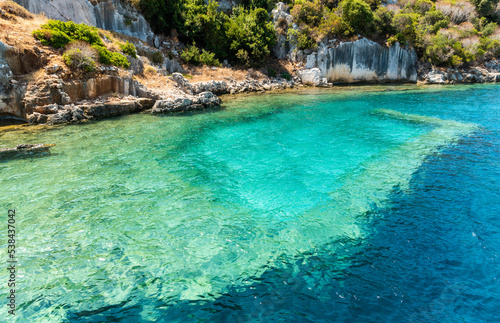 Coast of Kekova island with visible underwater structures of the Sunken City, in Antalya Province of Turkey