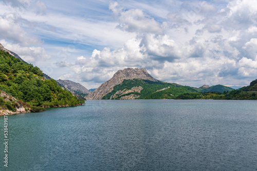 Embalse de Riaño, located north of Leon, on the border with Asturias, showing the high peaks that surround it.