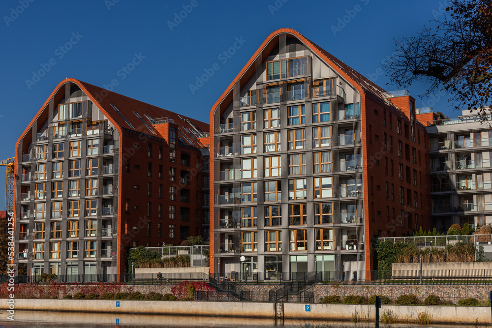 New houses on the Motlawa River in Gdansk New houses on the Motlawa River in Gdansk